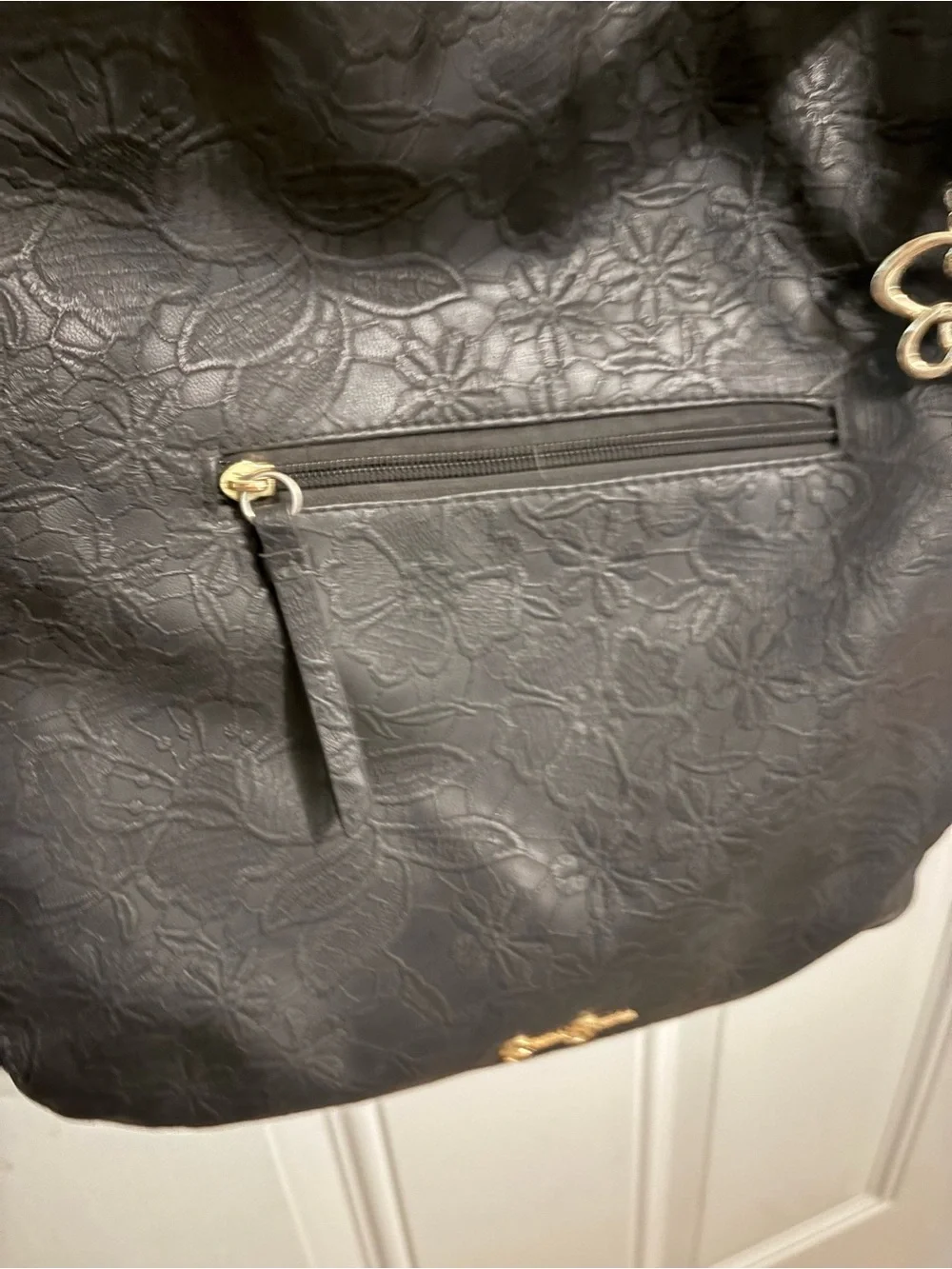 Jessica Simpson Black Floral-Embossed Shoulder Bag with Gold Accents
